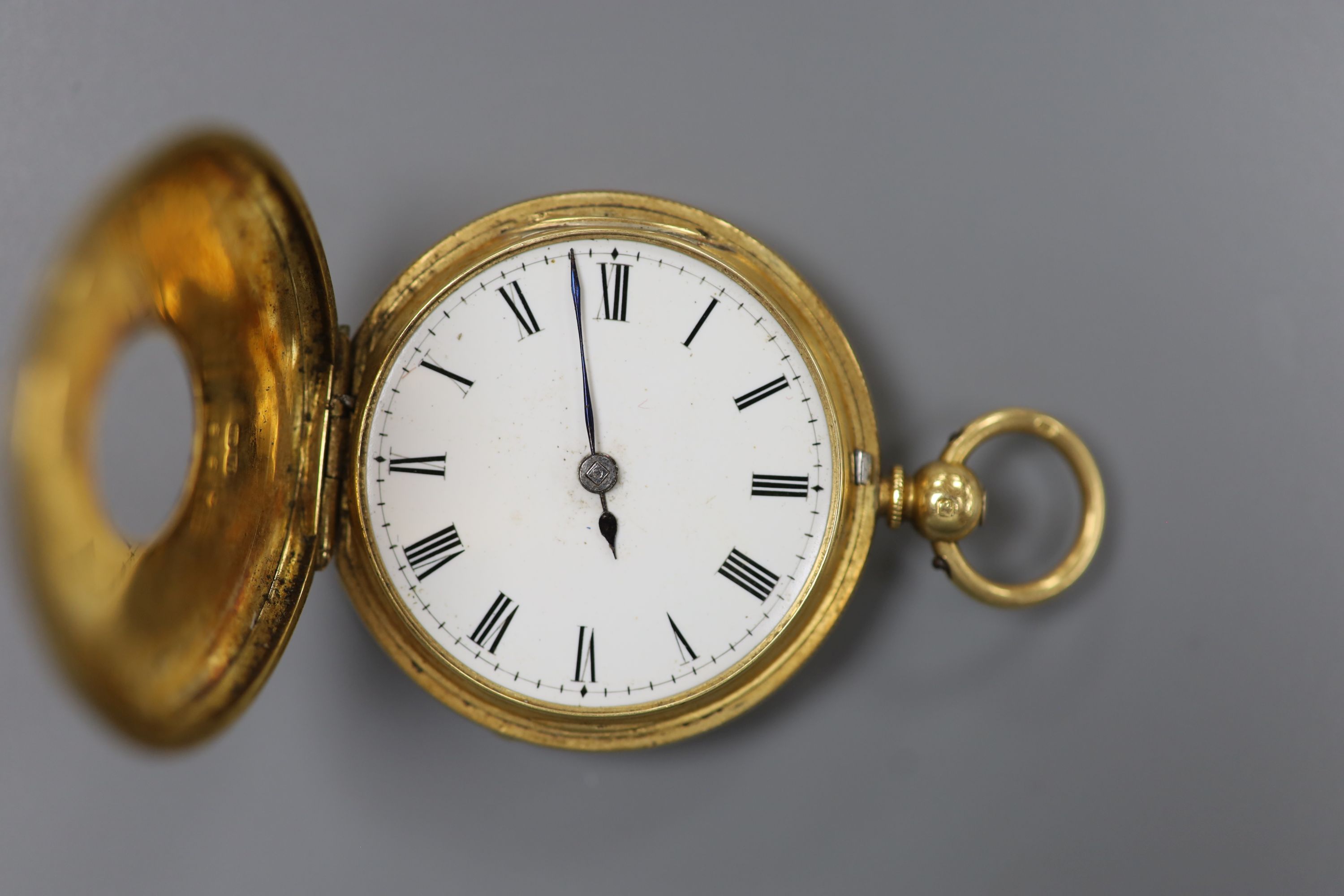 A late 19th century engraved 18ct gold half hunter keywind pocket watch